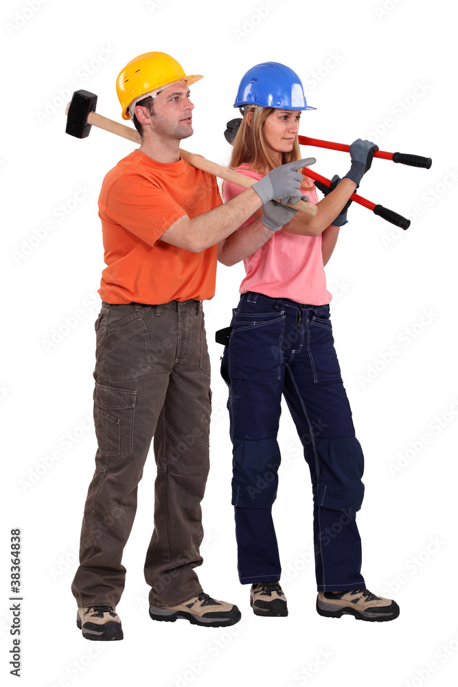 Construction team with boltcutters and a sledgehammer Construction team with boltcutters and a sledgehammer