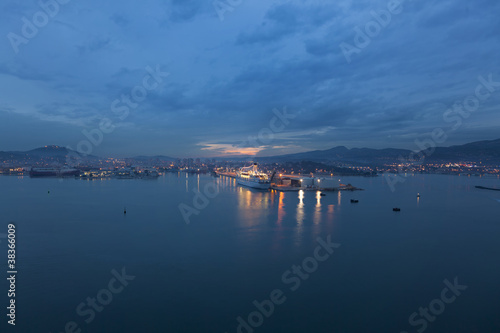 late sunset and port lights light up Toulon's harbour