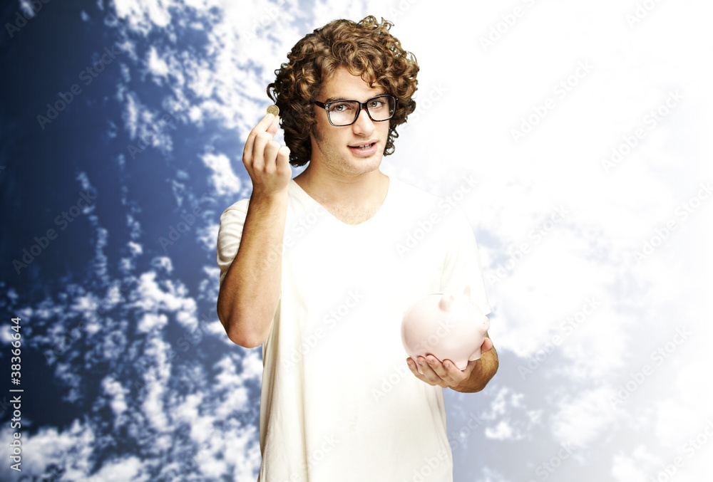 Naklejka premium man wiht piggy bank