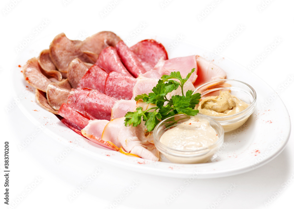 Meat delicatessen plate with souce Meat delicatessen plate with souce