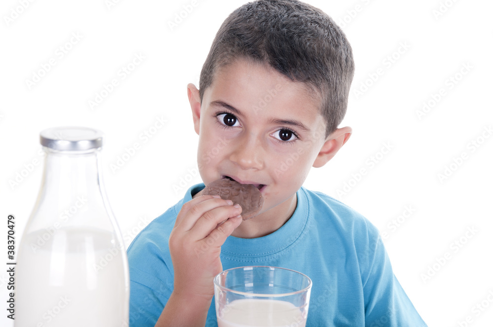 little boy drinking milk and cookies little boy drinking milk and cookies