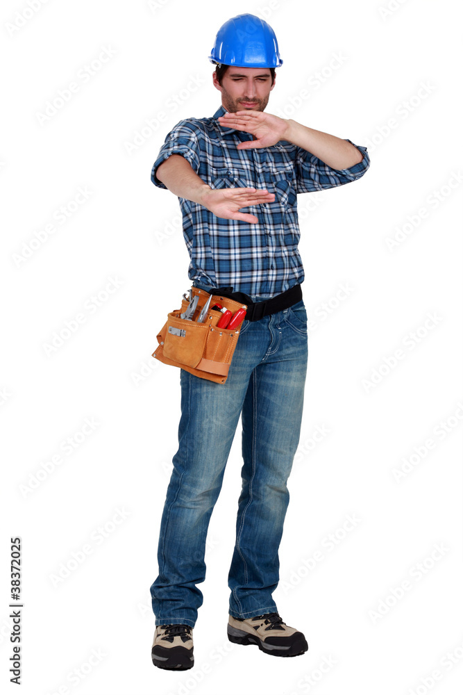 A manual worker protection his eyes. A manual worker protection his eyes.