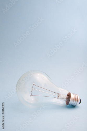Light Bulb on a Blue Background.