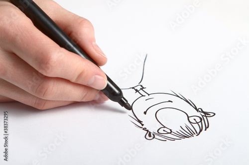 Human Hand drawing caricature of man
