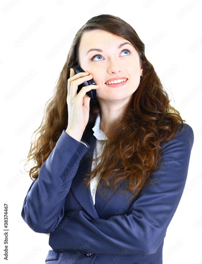 The positive business woman is in talks on the phone. The positive business woman is in talks on the phone.