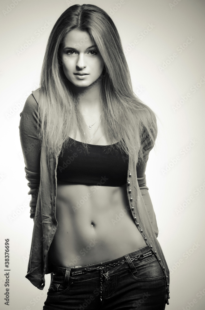 Black and white head shot of young woman with long hair Black and white head shot of young woman with long hair
