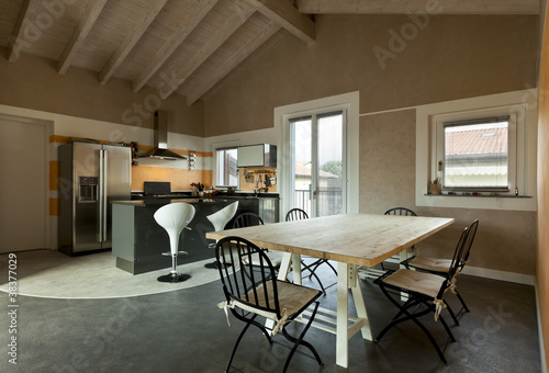 interior, view of dining table and kitchen