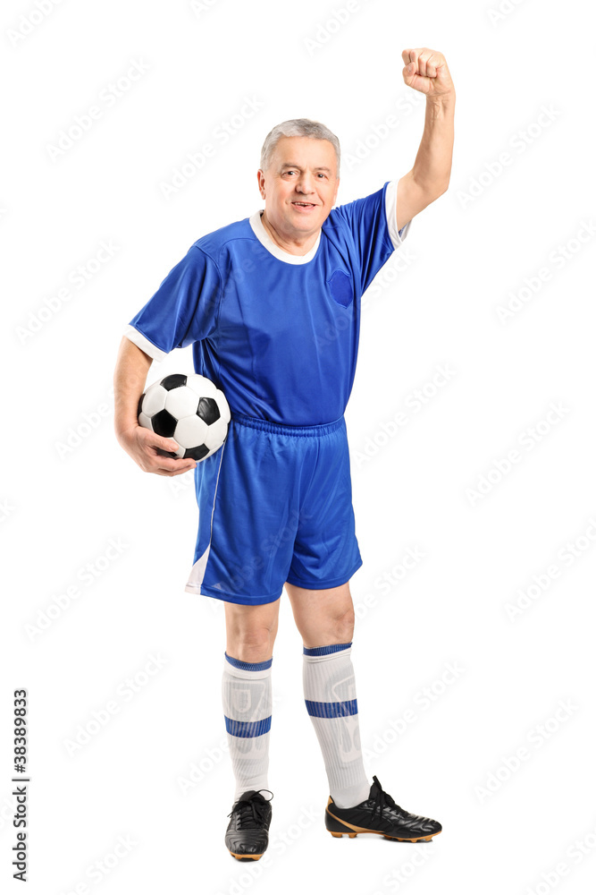 Mature fan wearing a sport wear holding a football and gesturing