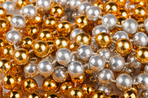 Background of gold and silver beads