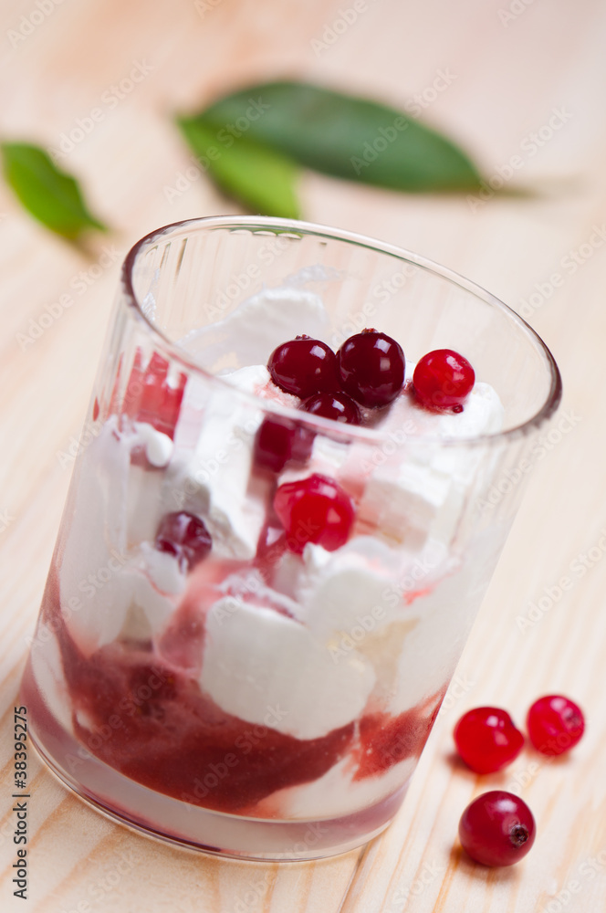 Ice cream with bright red berries. Ice cream with bright red berries.
