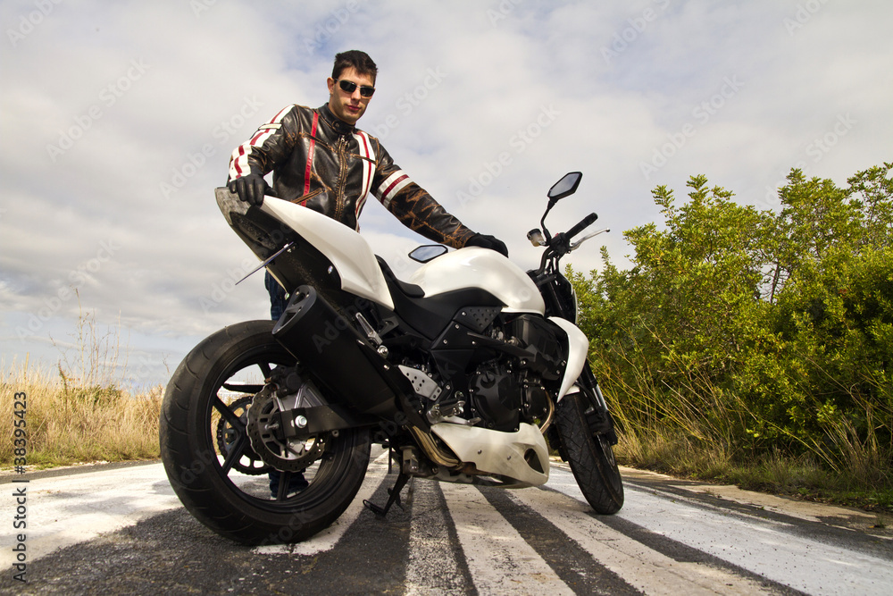 Obraz premium man with a motorcycle