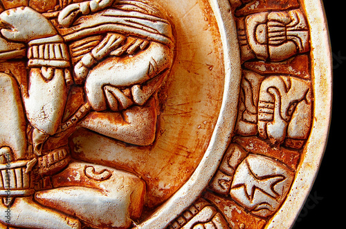 Closeup of glyphs on a Mayan calendar photo