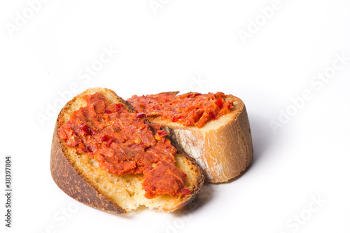 Bread with 'nduja isolated on white