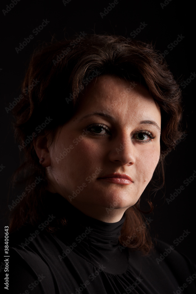 Portrait of a woman on a black background