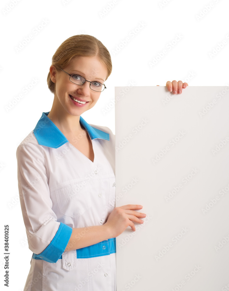 beautiful young female doctor holding a blank billboard beautiful young female doctor holding a blank billboard