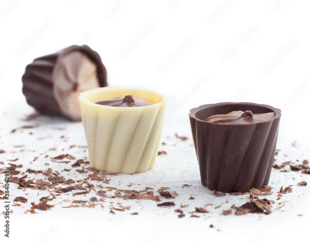 Chocolate baskets and chips on a white background. Chocolate baskets and chips on a white background.