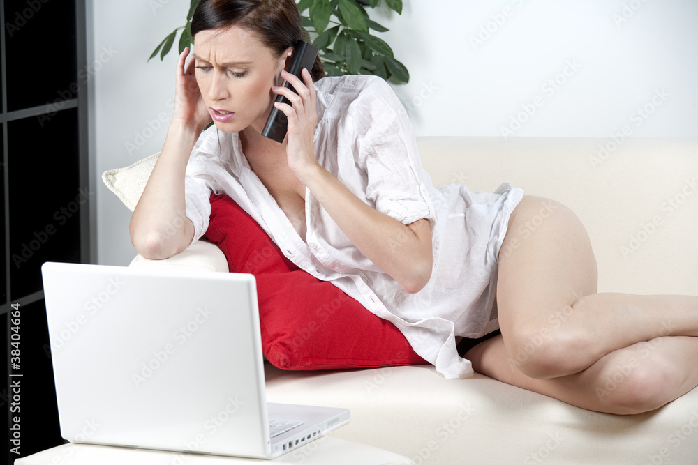 Woman in casual wear expressing concern on the phone Woman in casual wear expressing concern on the phone