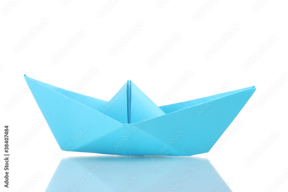 Origami boat out of the blue paper isolated on white Origami boat out of the blue paper isolated on white