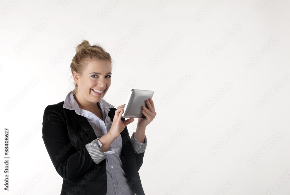 A young business woman is pleased with the Tablet PC A young business woman is pleased with the Tablet PC