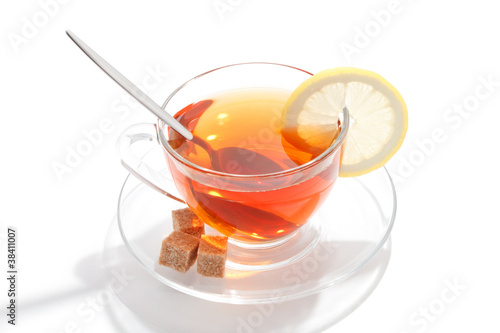 Glass cup of tea with white background