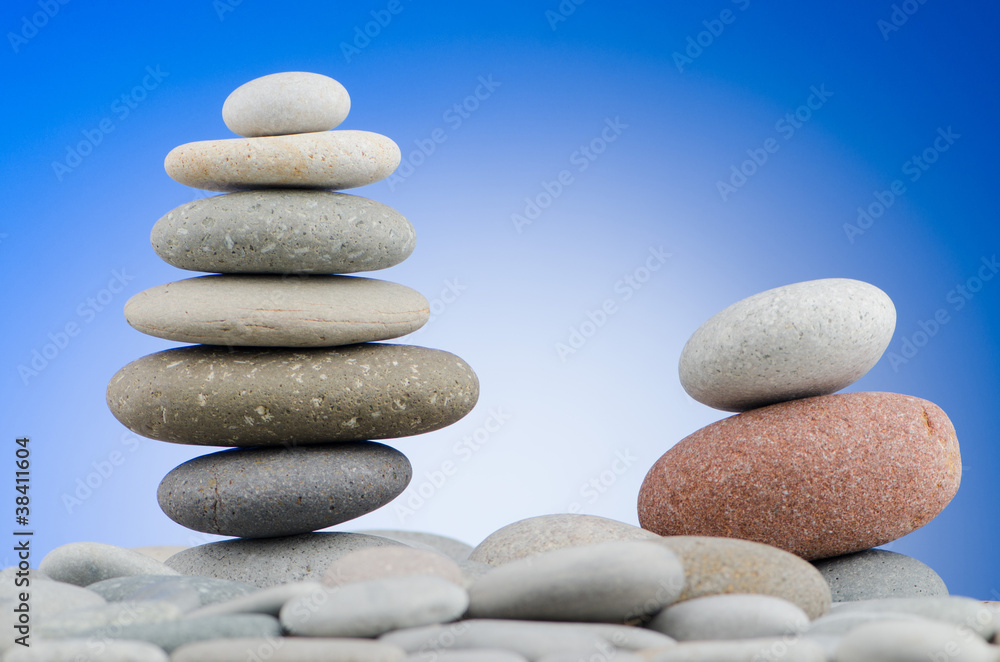 Pebbles stack against gradient background Pebbles stack against gradient background