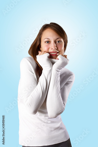 Young girl in white sweater