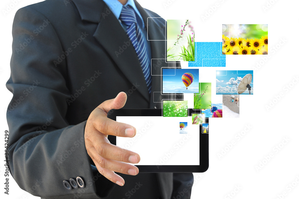 businessman hand holding touch pad PC on white background businessman hand holding touch pad PC on white background