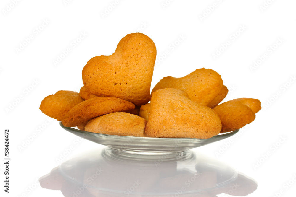 Heart-shaped cookies on glass plate isolated on white Heart-shaped cookies on glass plate isolated on white