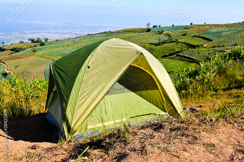 Camping tent in the mountains. © doraclub