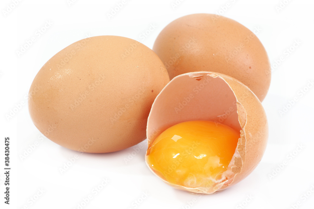 Eggs Isolated On A White Background. One Egg Split. Eggs Isolated On A White Background. One Egg Split.
