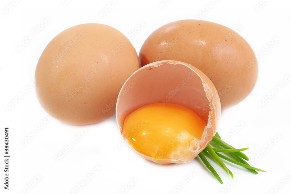 Eggs Isolated On A White Background. One Egg Split. Eggs Isolated On A White Background. One Egg Split.