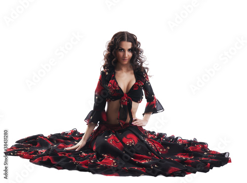 Fotografija young woman sit in gypsy black and red costume