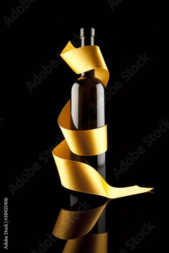 Gold ribbons around bottles