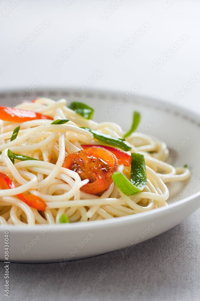 Spaghetti sautéed with vegetables