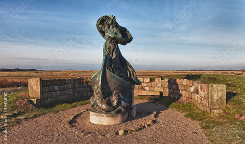 Statue of Queen Dagmar looks towards Ribe, Denmark photo