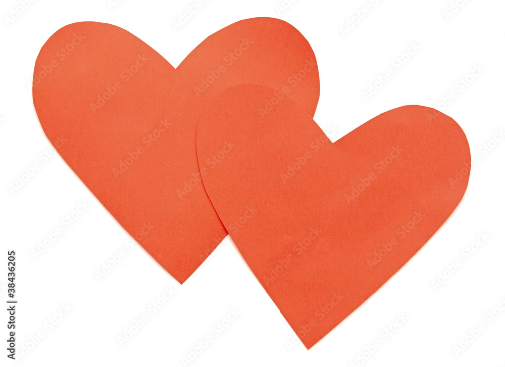 close up of paper heart shapes on white background