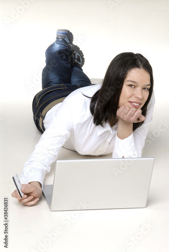 Happy woman shopping online photo