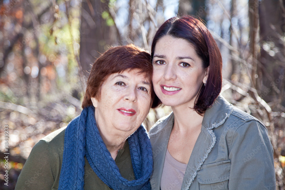 Obraz premium Portrait of Happy Adult Mother and Daughter
