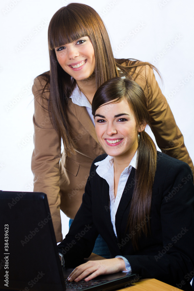 two business women in the office two business women in the office