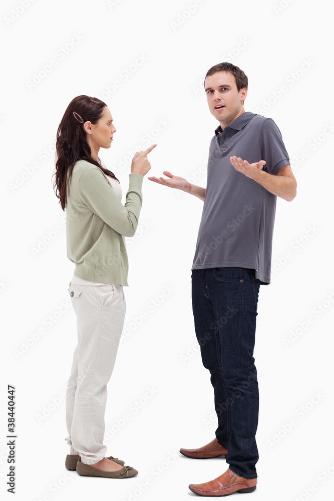 Man shrugged his shoulders is scolded by woman Man shrugged his shoulders is scolded by woman