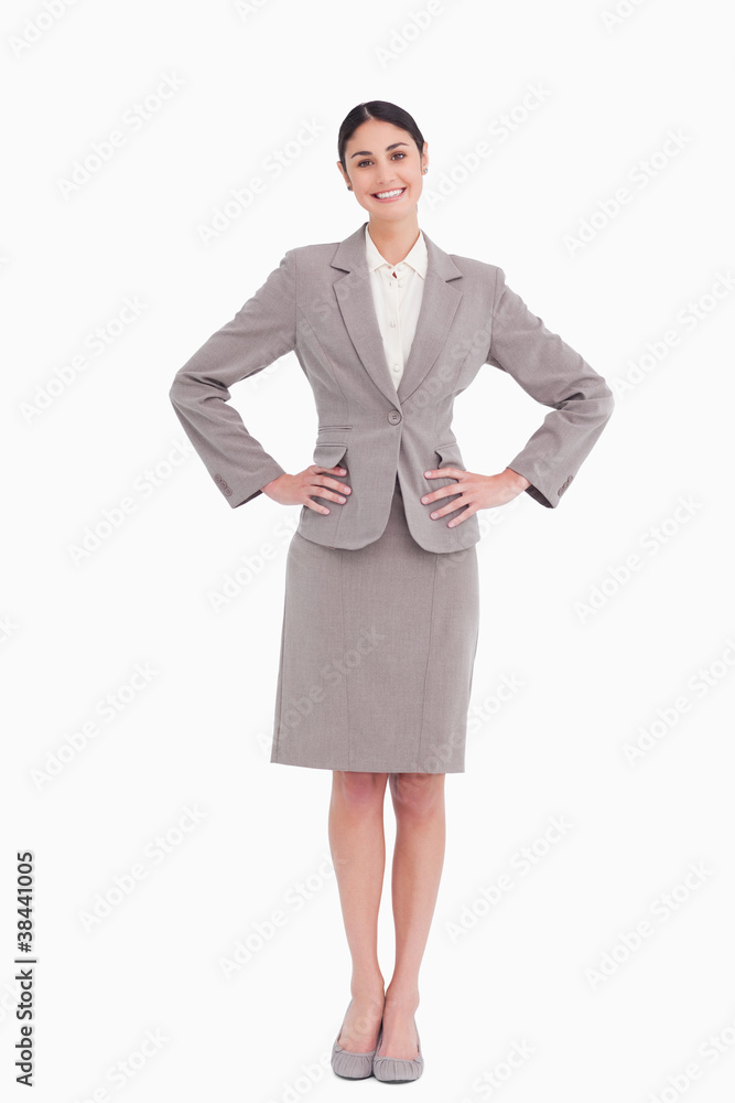 Smiling businesswoman with hands on her hip Smiling businesswoman with hands on her hip