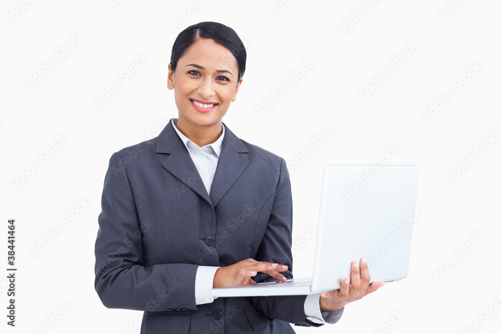Close up of smiling saleswoman with her notebook Close up of smiling saleswoman with her notebook