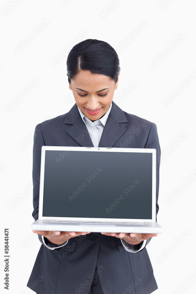 Close up of saleswoman presenting screen of her laptop Close up of saleswoman presenting screen of her laptop