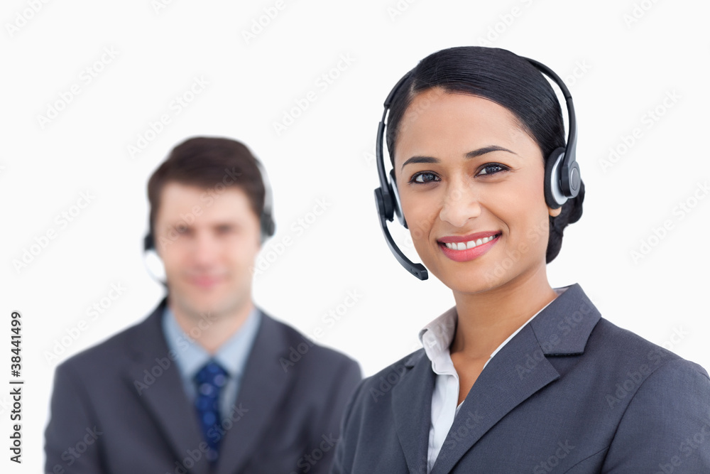 Close up of smiling call center agents Close up of smiling call center agents