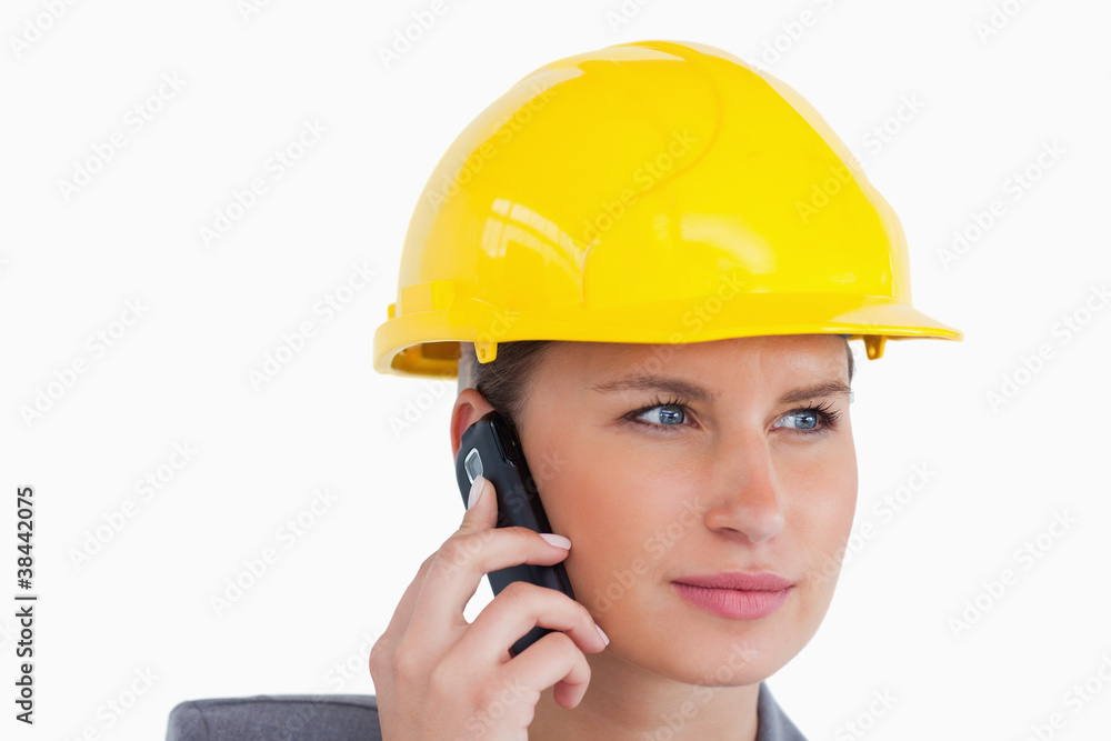 Close up of female architect on her cellphone Close up of female architect on her cellphone
