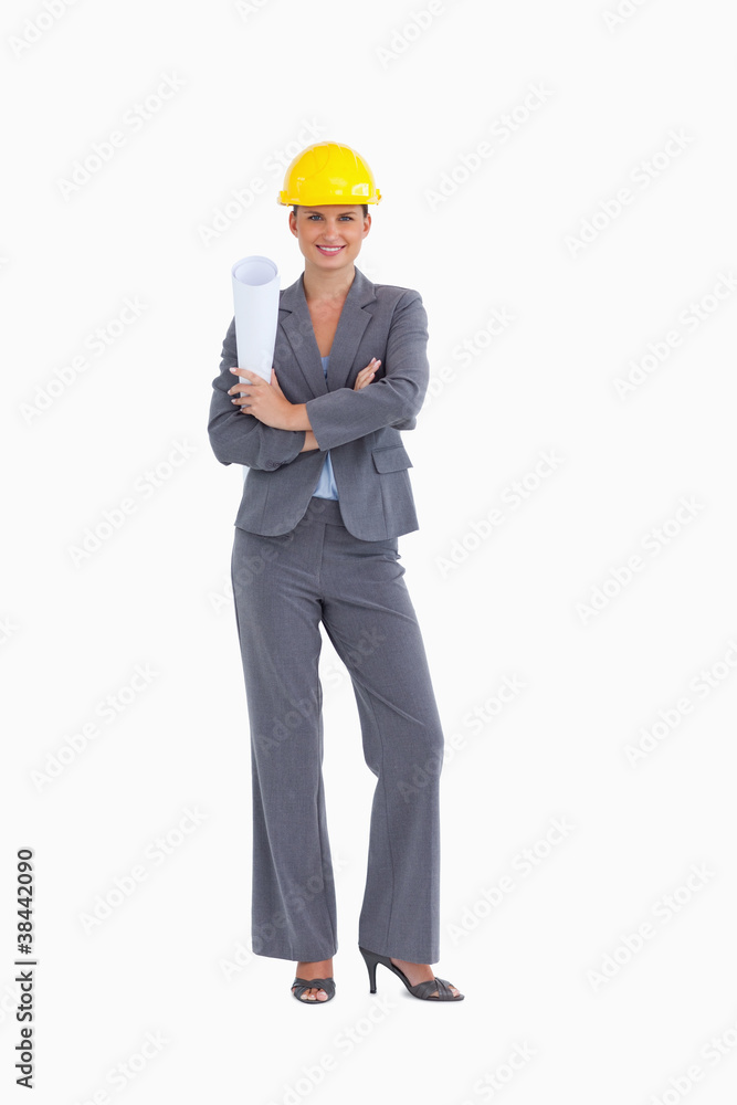 Smiling female architect with folded arms Smiling female architect with folded arms