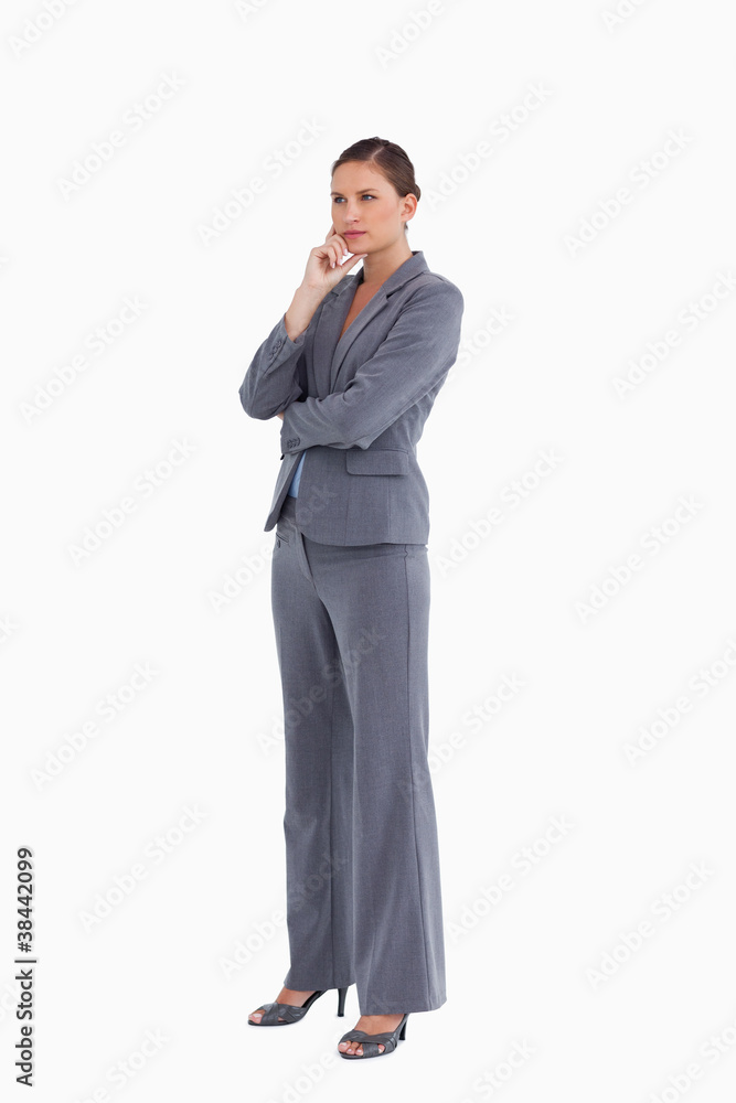 Side view of tradeswoman in thinkers pose Side view of tradeswoman in thinkers pose