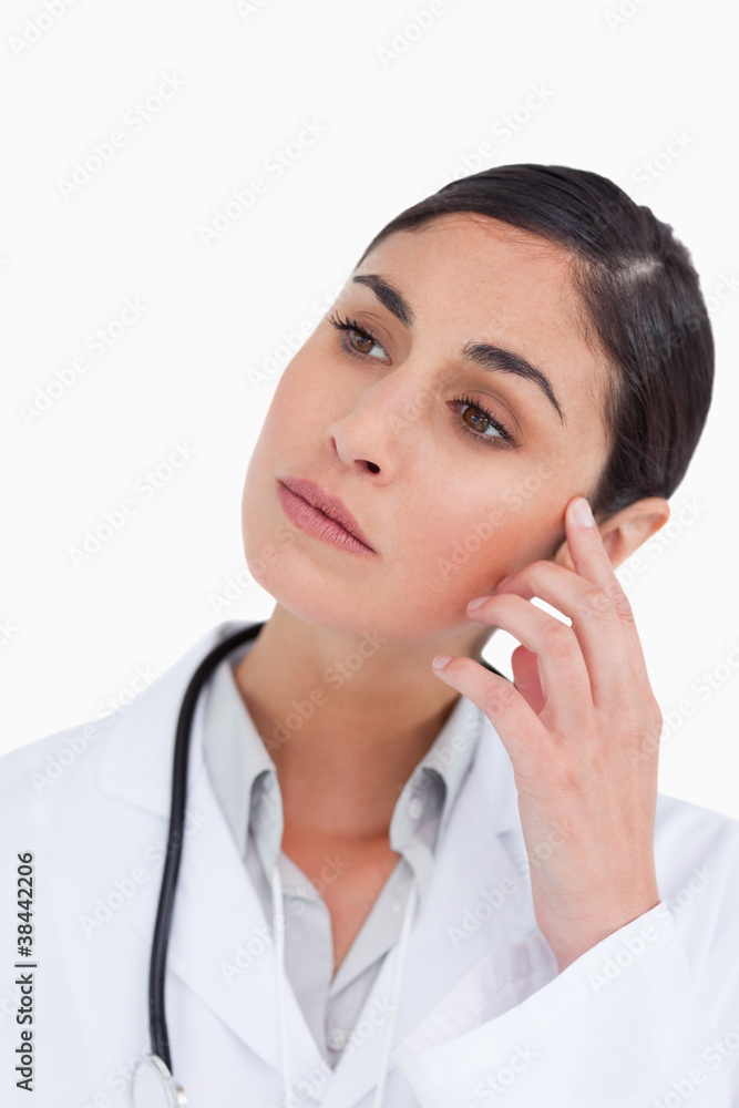 Close up of thoughtful female doctor Close up of thoughtful female doctor