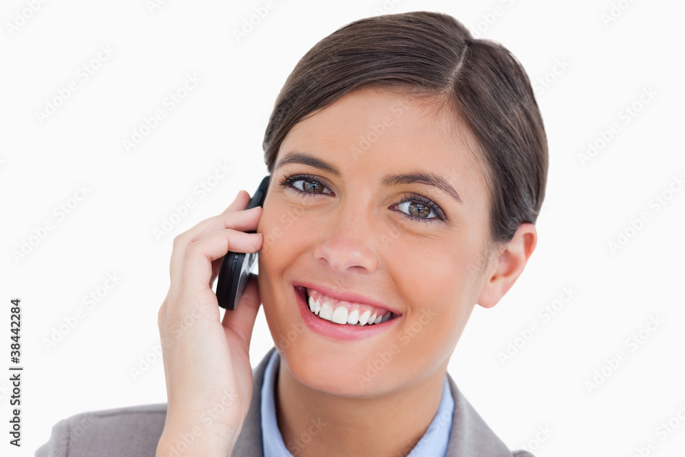 Close up of female entrepreneur on her mobile phone Close up of female entrepreneur on her mobile phone
