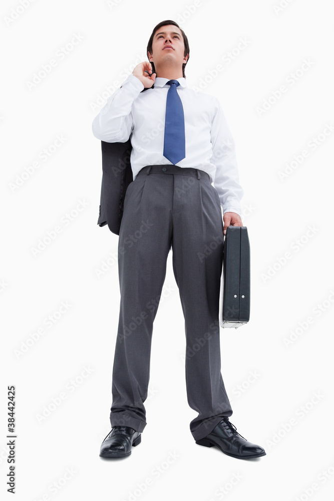 Confident tradesman with suitcase and jacket Confident tradesman with suitcase and jacket
